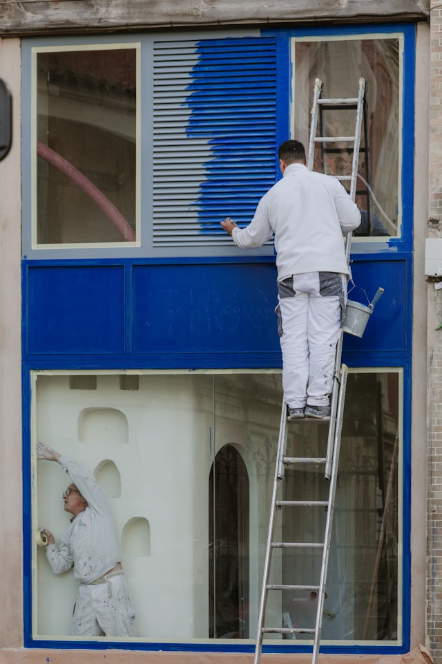A Vanilla Painters crew member at work